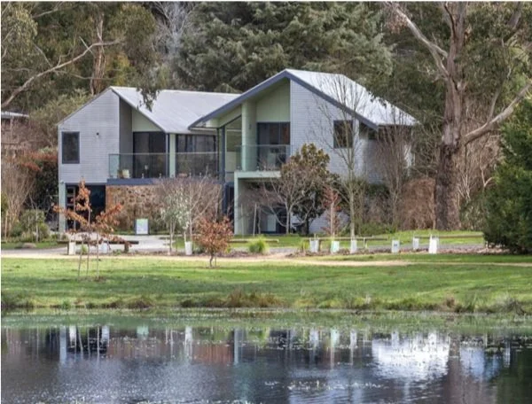 View across the lake toward Trentham Lake Villas