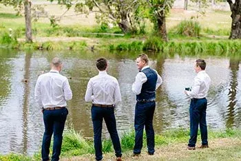 Wedding photographs taken in the gardens at Trentham Lake Villas